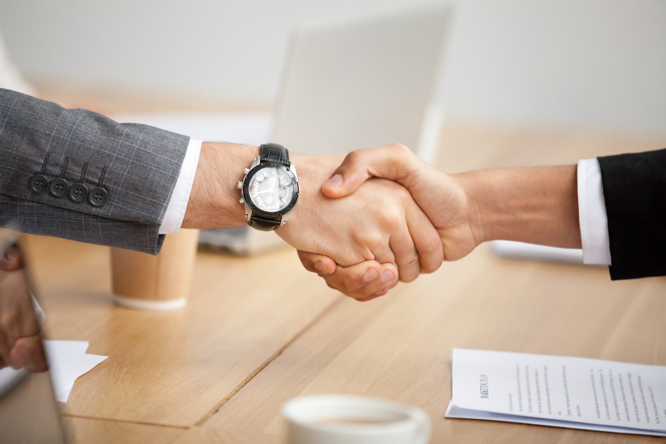 https://brushpic.com/wp-content/uploads/2022/07/closeup-view-handshake-two-businessmen-suits-shaking-hands-scaled.jpg